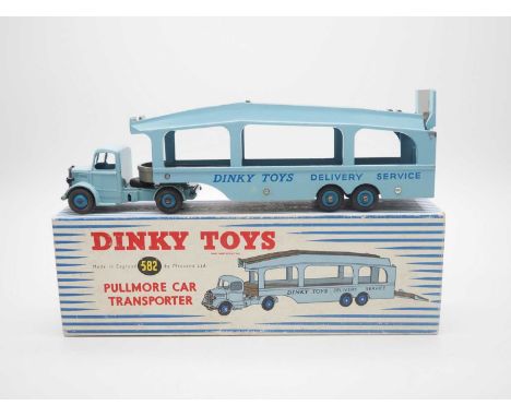 A DINKY No 582 Bedford Pullmore Car Transporter with rare 3 x rivet sides - light blue cab and trailer, grey beds, mid-blue r