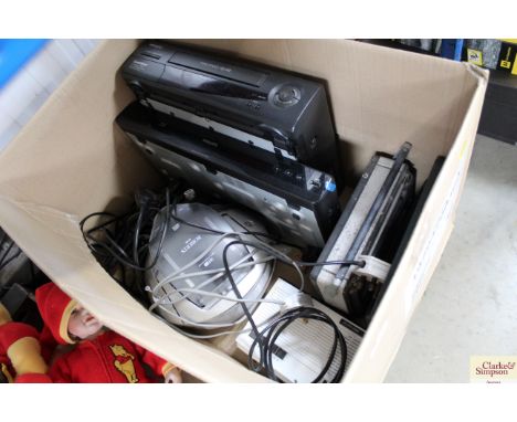 A box containing a Robert's radio/CD player, Philips DVD recorder, VHS player etc.