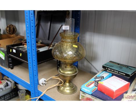 A brass oil lamp converted to electricity 