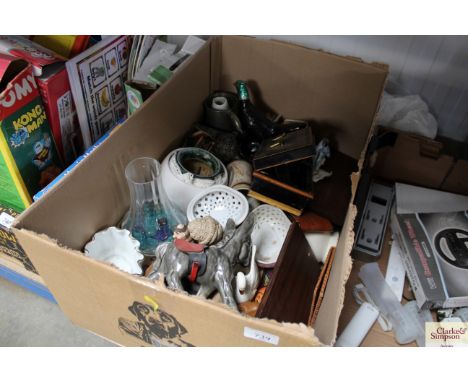 A box containing various sundry glass and china, metal cash tin, cribbage board etc.