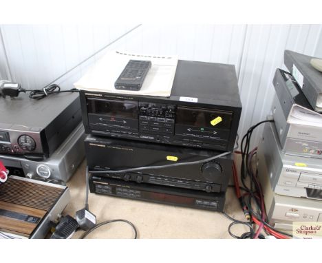 A Marantz Stereo Double Cassette deck, Marantz master amplifier and a Marantz stereo tuner with remote control and instructio
