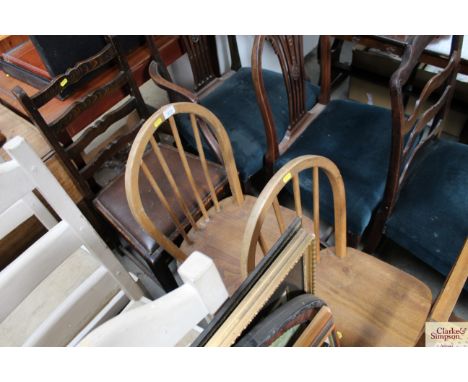 An oak ladder back chair together with a pair of elm seated stick back chairs