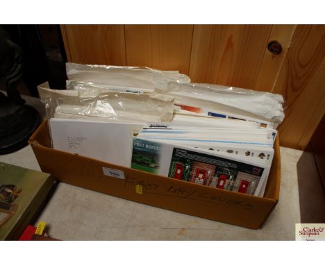 A box containing various First Day covers