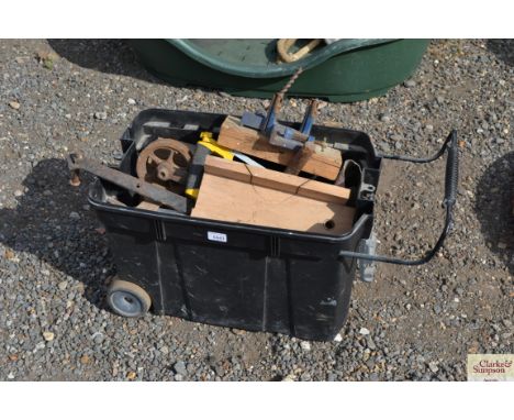 A part plastic wheeled tool box and contents of tools including hack saw etc.