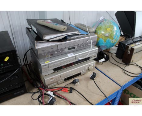 A Sharp VHS player, Funai VHS player and DVD recorder, JVC VHS player (sold as seen)