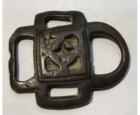 Decorated Celtic bronze &nbsp;4 way strap junction. H.56mm. W.45mm. Lovely example with a deep even patina with a small cross