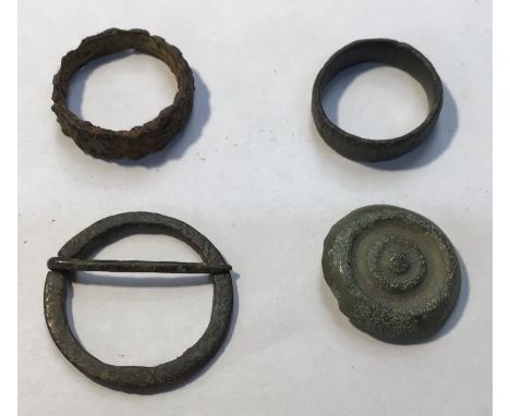 Bronze Age Button (earliest form of button) found in Norfolk with another Bronze Age buckle and two rings one decorated with 