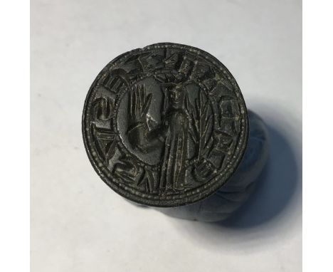 Medieval “chess piece” circular style bronze seal matrix, hexagonally facetted handle with pointed trefoil pierced terminal. 