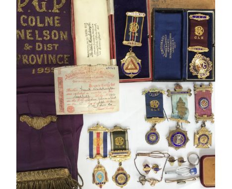Collection of Masonic jewels including 5 hallmarked Silver Gilt, Sash, base metal jewels and other items.