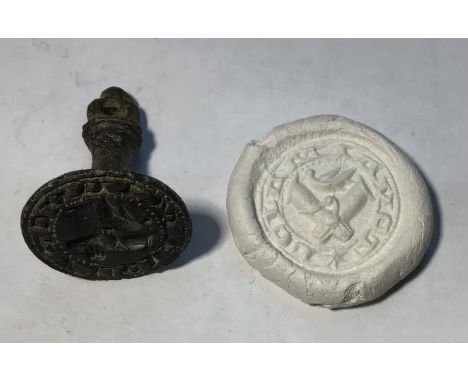 Medieval “chess piece” circular style bronze seal matrix, hexagonally facetted handle with pointed pierced terminal.Seal desi