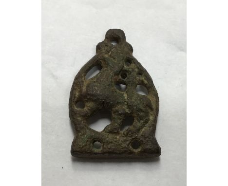 Bronze Viking strapend. 5cm x 3cm, 21.7g. Possibly depicting a man on horseback.