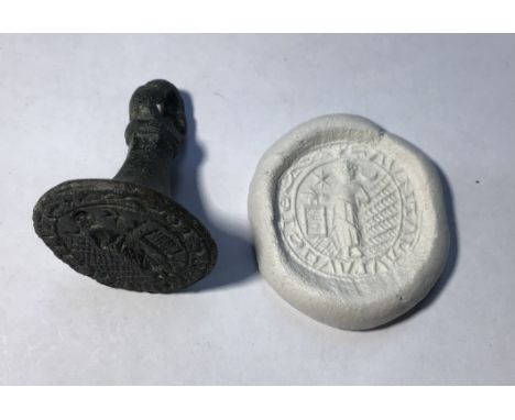 Medieval “chess piece” circular style bronze seal matrix, hexagonally facetted handle with pointed trefoil pierced terminal. 