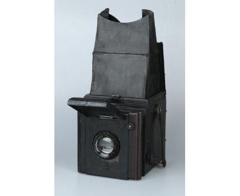 A Houghton-Butcher Popular Pressman SLR Camera,black, body G, light signs of use, shutter untested, with Dallmeyer London Ana