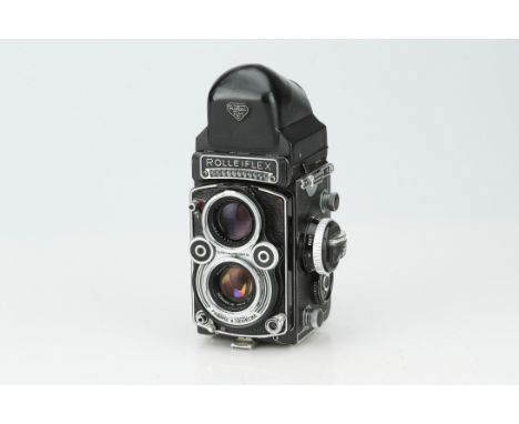 A Rolleiflex 3.5 F Medium Format TLR Camera,black, serial no. 2263362, body F-G, shutter sticking, with right angle finder, o