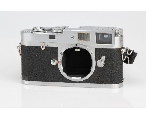 A Leica M2 35mm Rangefinder Camera,chrome, serial no. 976155, body G, shutter working, signs of use throughout, rangefinder p