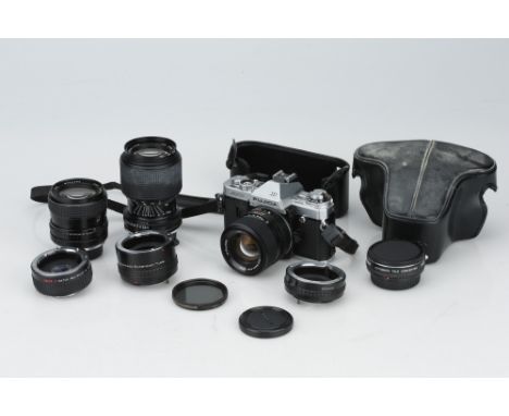 A Fujica AX-3 35mm SLR Camera,chrome, untested, together with a Tamron 70-210 &amp; a Tokina 25-50mm lens, untested, also wit