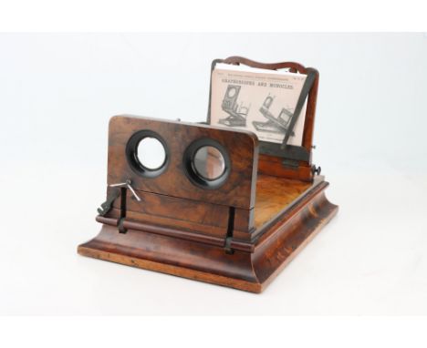 An Unmarked Graphoscope,victorian, walnut, with a stereoscope, monocle lens diameter 3Â¾", missing matte screen from image st