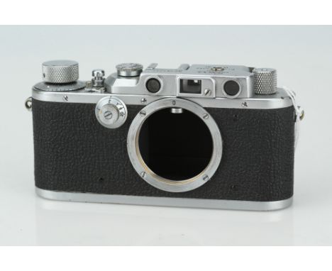 A Leica IIIa Rangefinder Camera,chrome, serial no. 262202, body, F-G, shutter working, flash sync added to top plate