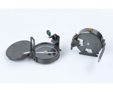 A Prismatic Compass and a Prismatic ClinometerEnglish, compass by Stanley, c.1915, a sophisticated example, twin filters to f