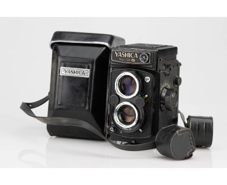 A Yashica Mat-124 G Medium Format TLR Camera,black, body G, shutter working, slower speeds too fast, with Yashinon 80mm f/3.5