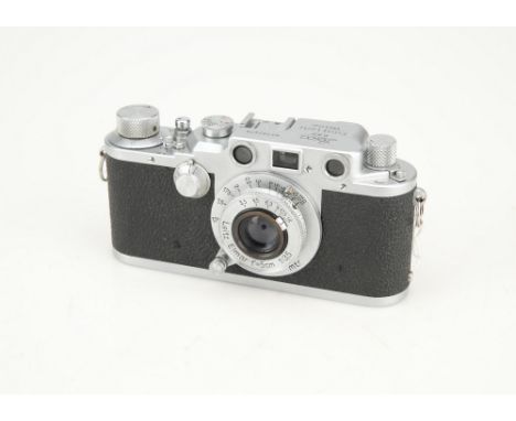 A Leica IIIc 35mm Rangefinder Camera,chrome, serial no. 392479, body G, shutter working but sticks on slow speeds, rangefinde