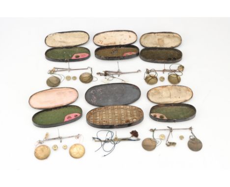 A Small Collection of Sovereign Coin Scales,early 19th century pocket balances in toleware, in imitation of tortoiseshell, 3 