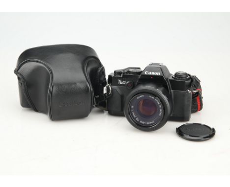 A Canon T-60 35mm SLR Camera,black, body VG-E, shutter working, tested with batteries, the viewfinder is clean &amp; bright, 