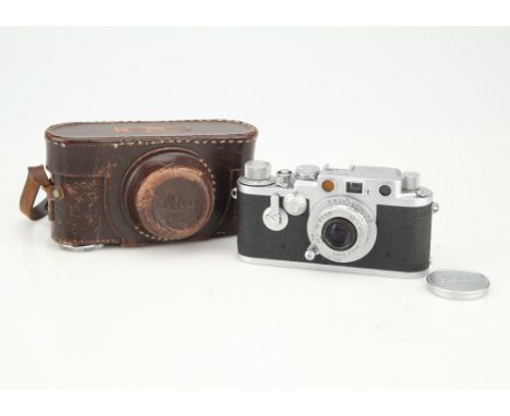 A Leica IIIf Delay Rangefinder Camera,chrome, serial no. 728746, with Leitz Elmar f/3.5 50mm lens, chrome / red scale, body, 