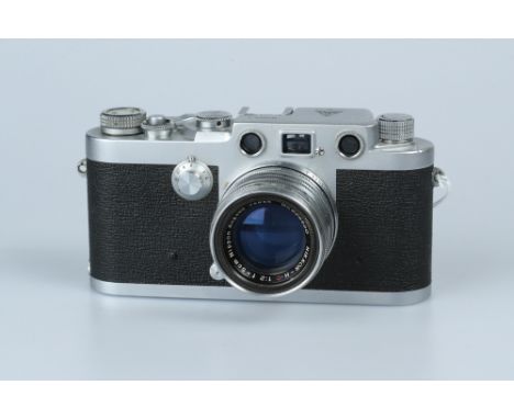 A Tower 46 Rangefinder Camera,chrome, serial no. 50612, with Nikon Nikkor-H.C f/2 50mm lens, body, VG, shutter working, lens,