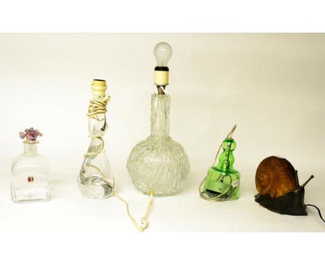 A Carlo Moretti, Murano Glass Decanter and Stopper, modern, with flower finial, 22cm high; A Moulded Glass Lamp Base, of shaf