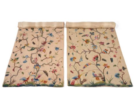 Two Similar 19th Century Crewel Work Curtains on a natural ground, of floral designs with parrot and peacocks to the hems, 13