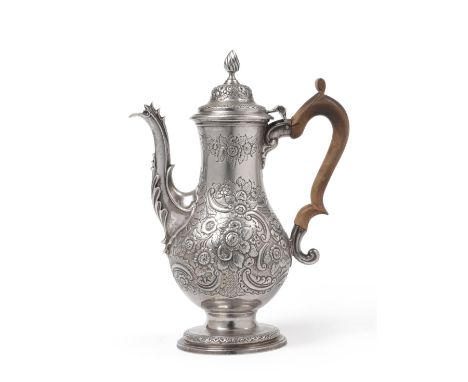 A George III Silver Coffee Pot, maker's mark W[?] over another, London 1778, pyriform and chased with scrolls and flowers to 