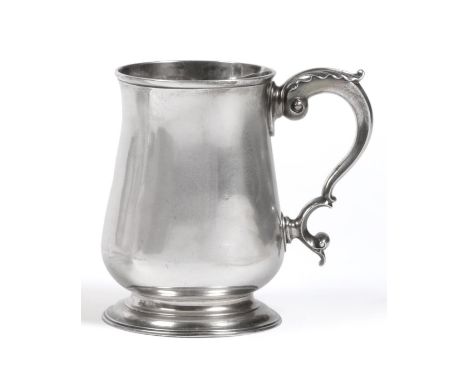 A George III Silver Mug, Francis Crump, London 1771, of plain baluster form with a double scroll acanthus capped handle and a