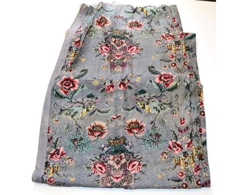 A 19th Century Floral Printed Cotton Length of Fabric on a mauve ground, with pink and blue flower heads, 79cm wide and 340cm