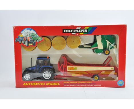 Britains 1/32 New Holland 6635 Tractor and Implement Set. M in Box.