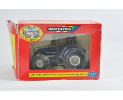 Britains 1/32 New Holland 8560 Tractor with Flotation Tyres. M in Worn Box.