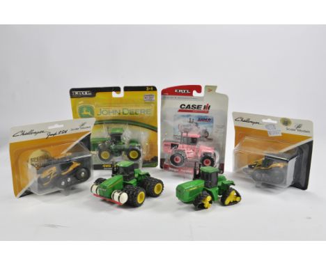 Group of 1/64 Farm Models including Challenger, John Deere and other OEM Tractor Brands. E to M mainly in boxes. (6)