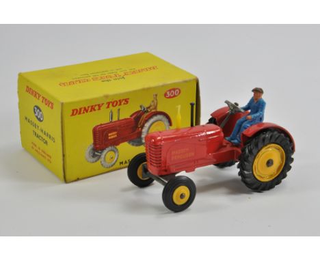 Dinky Toys No. 300 Massey Harris Tractor. Fine Example is NM to M in E Original Box.