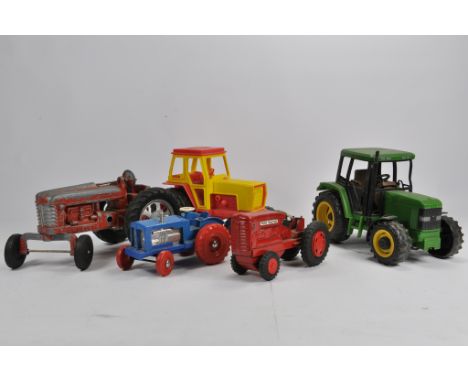 Group of misc Tractor Toys and Models. Plastic and Diecast issues from various makers including Bruder, Triang etc. Inc JD 64