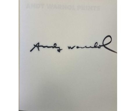 A 1985 catalogue raisonee of Andy Warhol's prints (Editions Schellman, 1985) signed to first page in good size by Andy Warhol