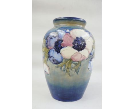 Moorcroft pottery vase, baluster form, light blue ground, anemone pattern, marked to base, with provenance 26cm highWith emai