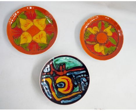 Two Poole pottery Delphis dishes shape no. 3A, 20cm in diameter and another Poole pottery Delphis dish, shape no.3, 20cm in d