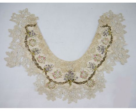 Victorian lace and embroidered collar, the embroidery showing bunches of flowers and ribbons, ??? beads and gold-coloured bug