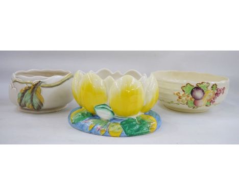 Clarice Cliff pottery bowl moulded as a waterlily, 13cm high, a Clarice Cliff pottery bowl, leaf decorated, 11cm high and a R