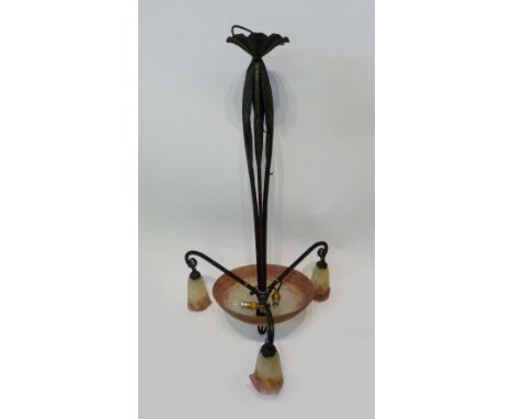 An Art Nouveau Patinated Metal and Opaque Glass Ceiling Light by Muller Freres, with a central light shade within three branc