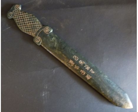 A Chinese Jade Letter Opener, bearing script, 38 cms long