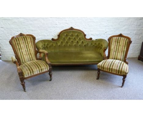 A Victorian Walnut and Marquetry Inlaid Three Piece Drawing Room Suite, comprising a three seater sofa with a carved button u