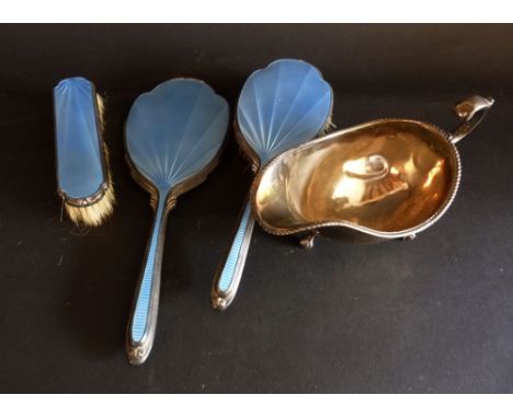 A Birmingham Silver and Blue Translucent Enamel Three Piece Dressing Table Set, together with a silver plated jug