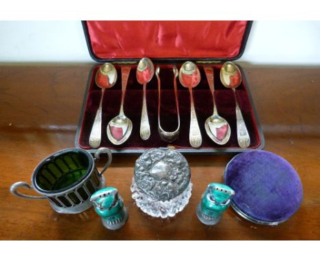 A Pair of Enamel Peppers, in the form of owls, together with a set of six Scottish silver tea spoons and tongs within a lined