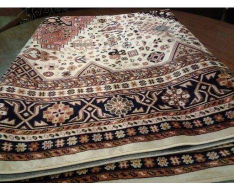 A Keshan Rug, with an allover design upon a blue ground, 190 cms x 140 cms
